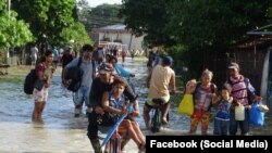 Residentes de Río Cauto, en Granma, evacuaron de urgencia ante el alto riesgo de inundación. 